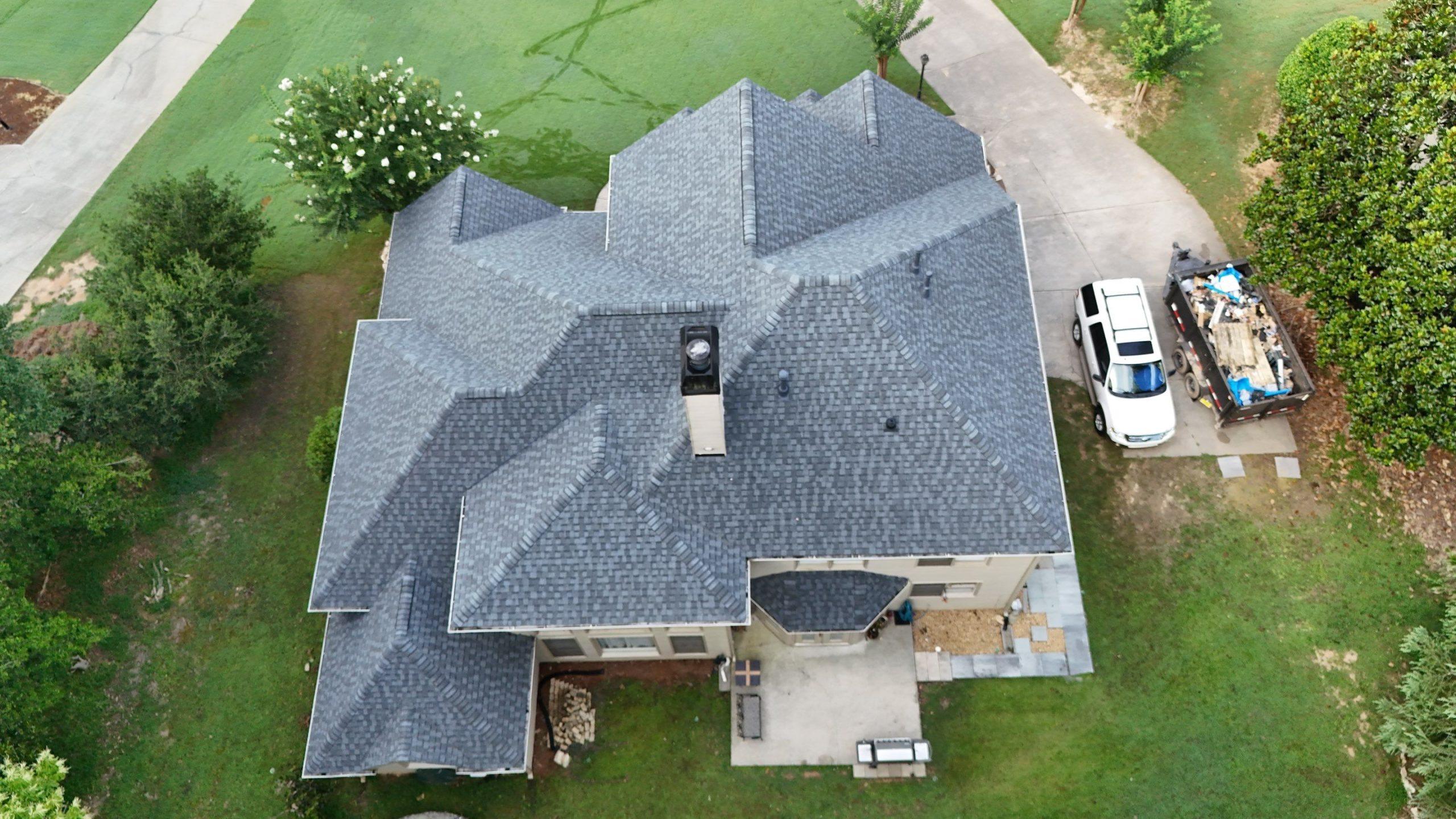 Ariel view of full roof replacement completed near Buford, GA by roofing and exterior company, Clark Brothers.