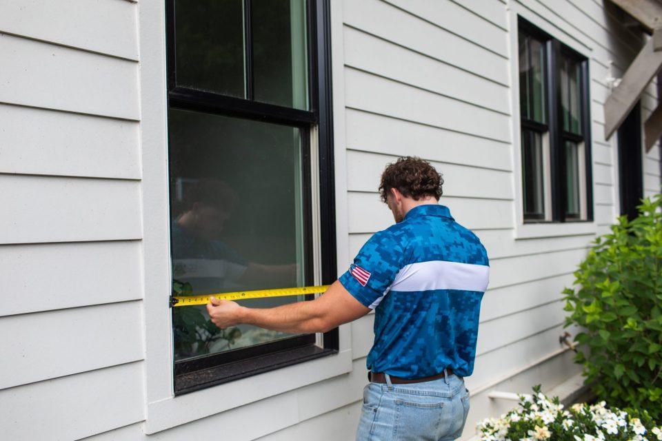 Clark Brothers team member completes a High-End Window Replacement in Atlanta
