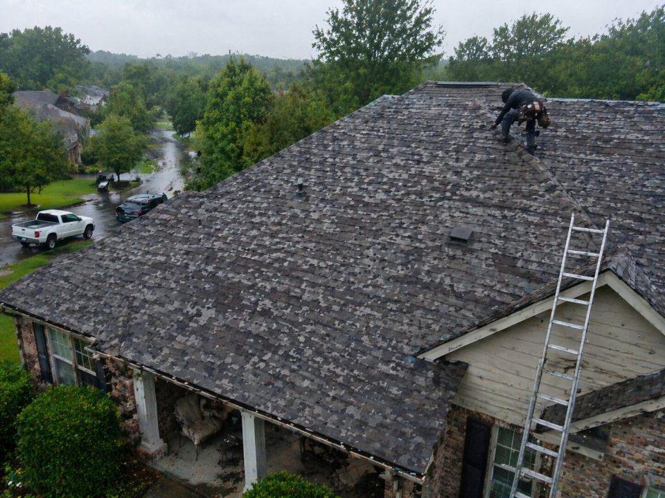 hail damage on asphalt roof shingles in Cumming GA after severe storm