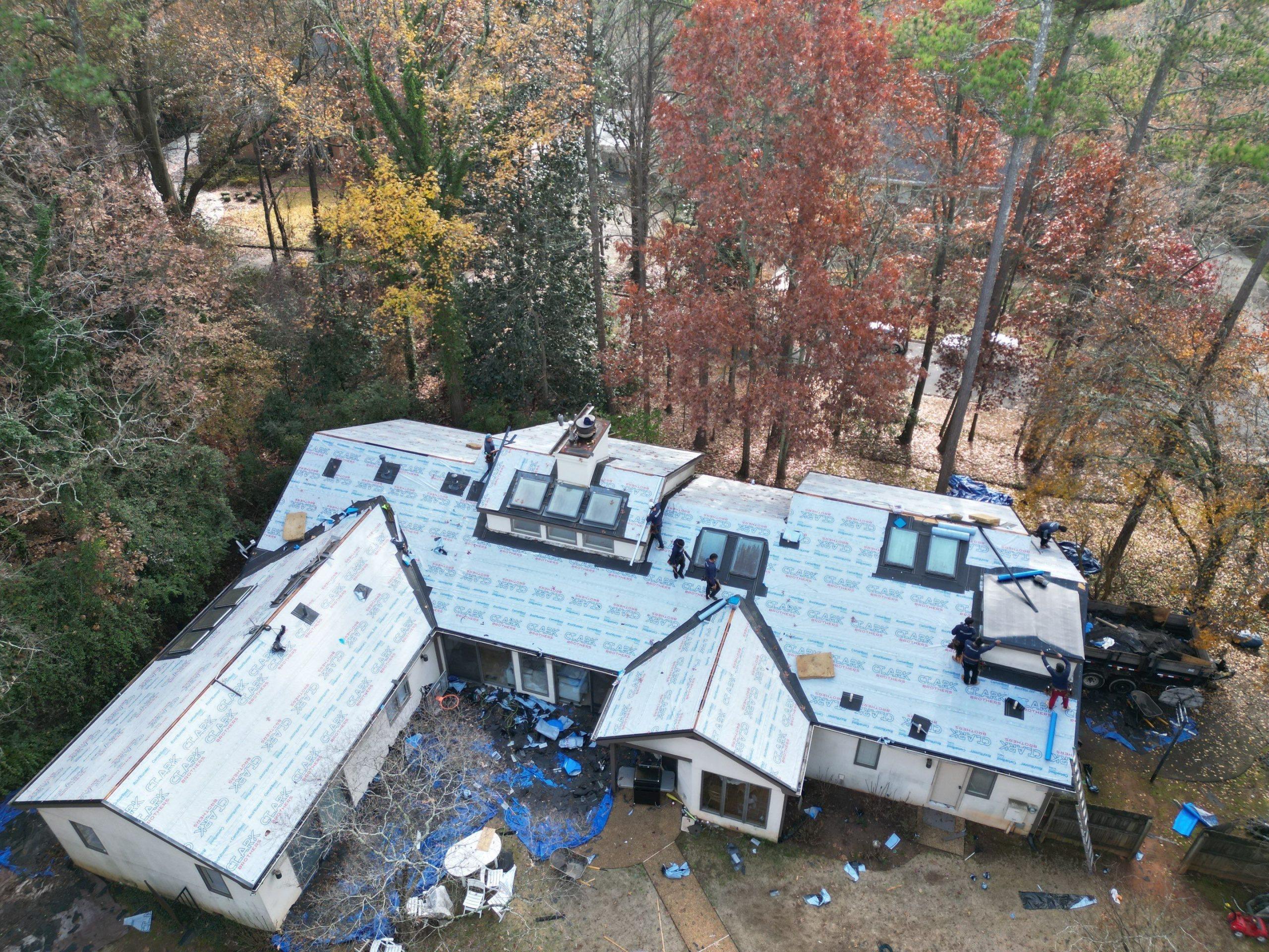 Residential roof installation by the team at Clark Brothers using CertainTeed Landmark- Weathered Wood