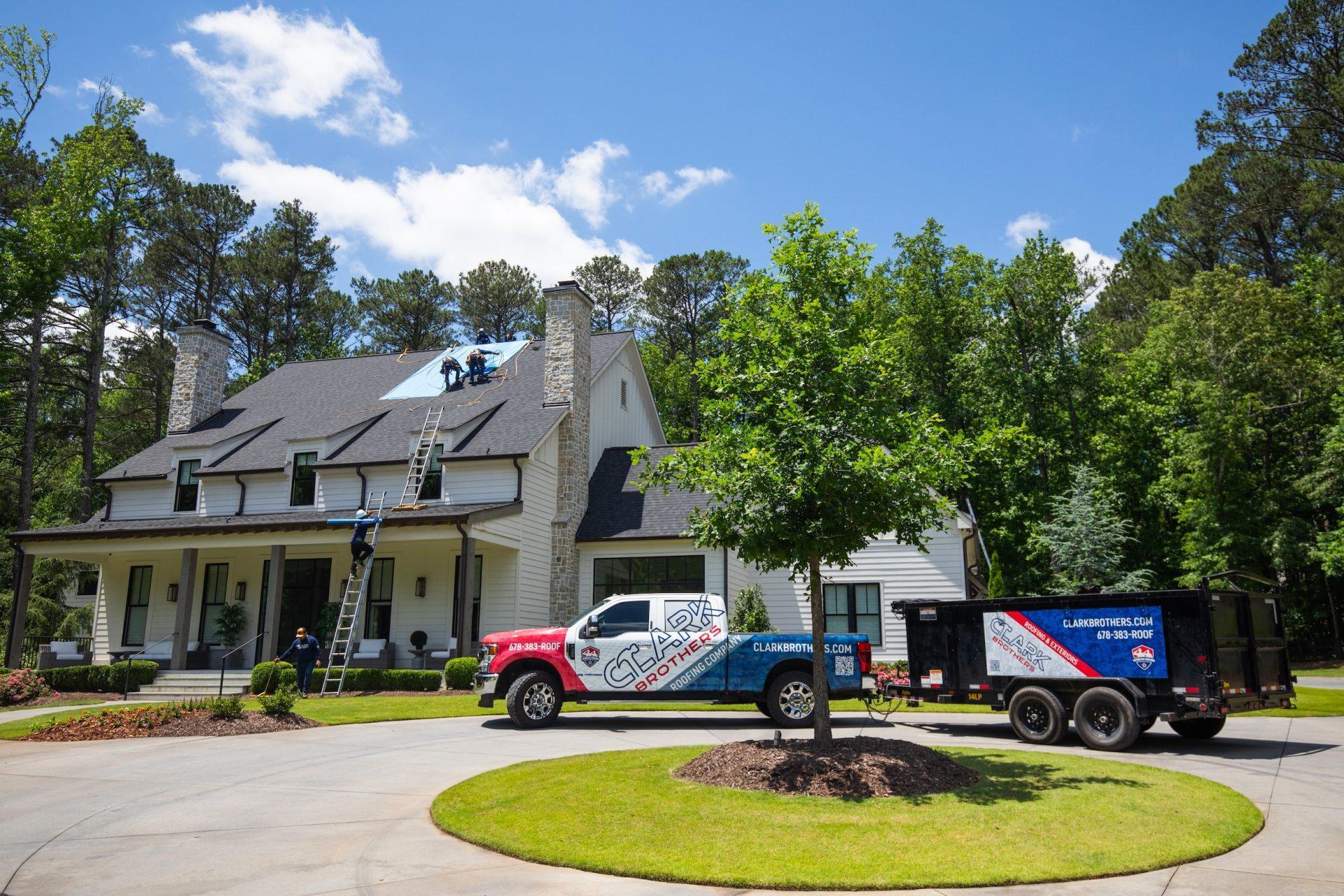 Residential Exterior Painting Services in Roswell, GA: Clark Brothers Roofing & Construction truck at home in Milton, GA