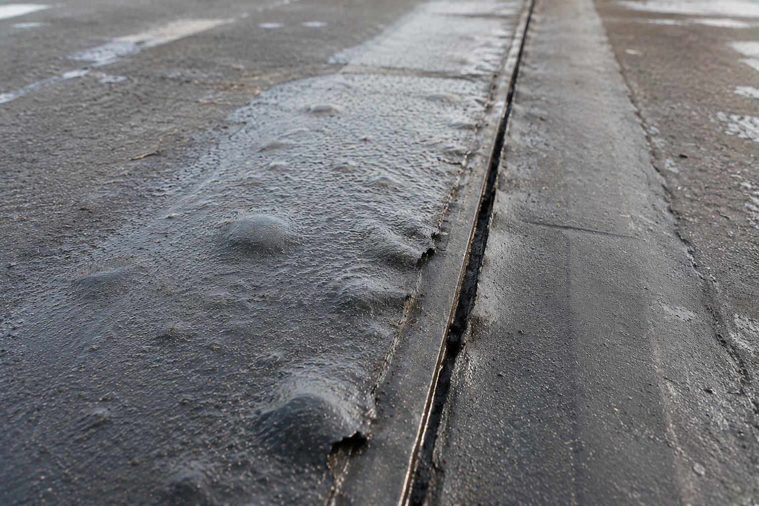 close-up of membrane damage on a commercial roof
